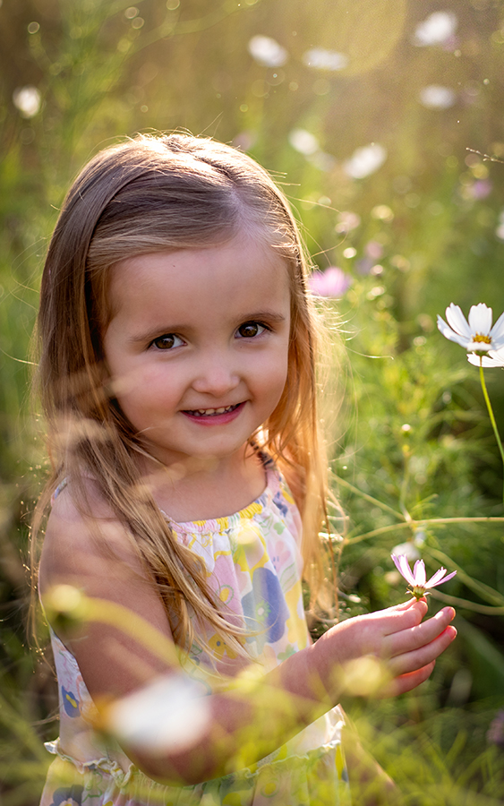 girl picking flowers